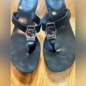 Gucci Black Sandals with Embossed Logo